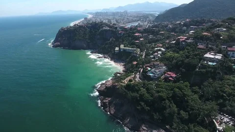 Approaching the beach through the rocks and the sea. Stock Footage 81134223