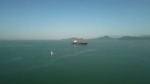Approaching a big vessel/cargo ship in the open ocean 4k 60fps Stock Footage 225434841