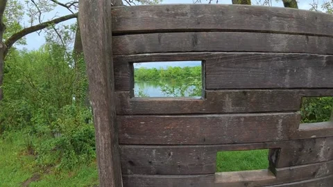 Approaching a bird watching hide screen in a natural park Stock Footage 335355723
