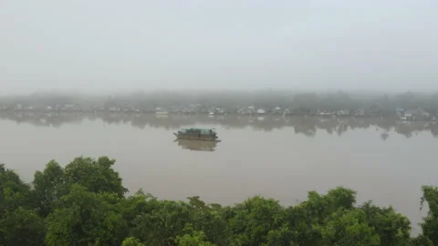 Approaching a Boat in the Middle of a Huge River, Borneo, 4K Stock Footage 148185750