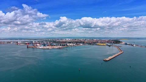 Approaching the breakwater of the large modern port. Maritime facility with Stock Footage 336267477