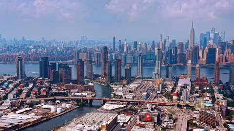 Approaching the bridge connecting Brooklyn and Queens. View on the East River Stock Footage 342077752