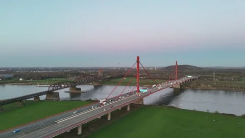 Approaching bridge over riverside meadows aerial shot Stock-Footage 331199970