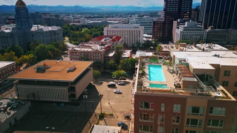 Approaching the building with the jacuzzi and swimming pool on the roof. Stock Footage 318736481
