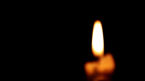 Approaching a burning candle, close-up shot Stock Footage 74430234