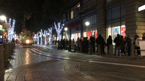 Approaching Cable Car surrounded by holiday lights 库存影片 71407795