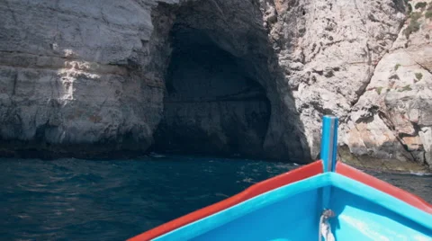 Approaching a cave by boat in Malta Stock Footage 65312239