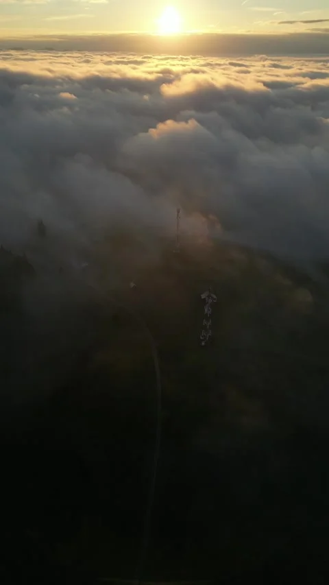 Approaching a Communication Tower Through Clouds Video stock 296738370