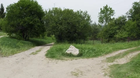 Approaching drone shot of a rock, a natural landmark located in Tsarichina Stock Footage 265989111