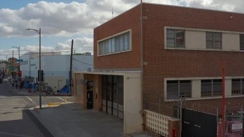 Approaching Fire station 9 with drone Stock Footage 107891322