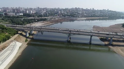 Approaching frame. Highway across the river. Bridge with road and transport. Stock Footage 127794884
