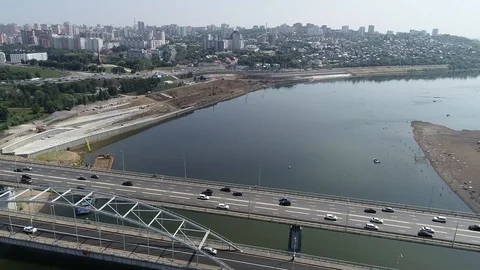 Approaching frame. Highway across the river. Bridge with road and transport. Stock Footage 127893362