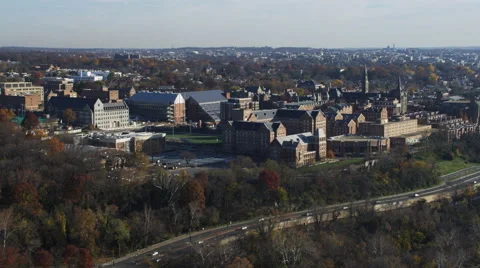 Approaching Georgetown University in Washington DC; Canal Road in foreground. Stock Footage