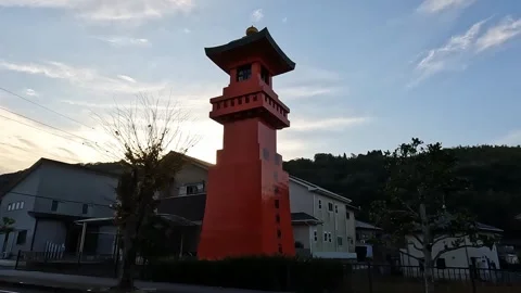 Approaching a giant red latern welcoming to  Yutoku Inari Shrine in Stock Footage 254512120