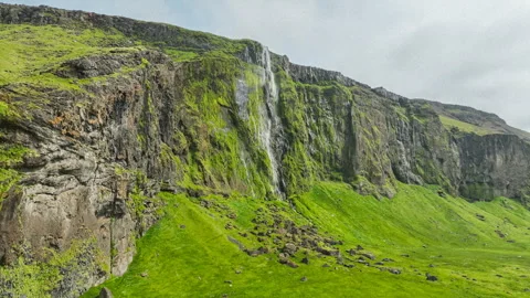 Approaching Iceland's Drífandi waterfall Stock Footage 313009013
