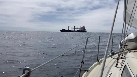 Approaching a large container ship on a crossing of the English Channel Stock Footage 255837187
