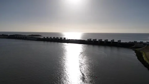 Approaching lock complex in strong backlit silhouette Stock Footage 331838772