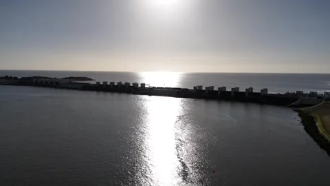 Approaching lock complex in strong backlit silhouette 库存影片 333435874