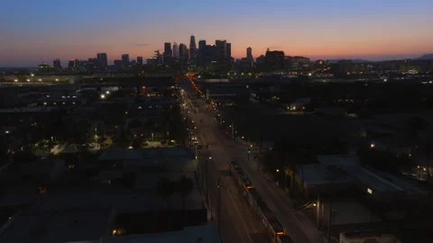 Approaching Los Angeles Skyline At Magic Hour Stock Footage 244336918
