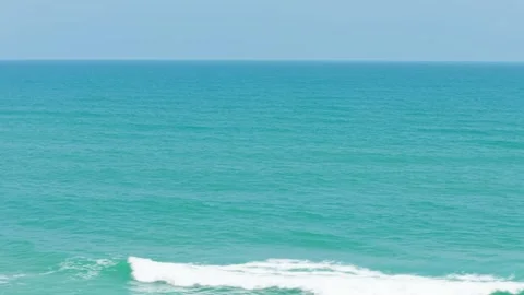 Approaching the Ocean on a Sunny Beach Stock Footage 308669916