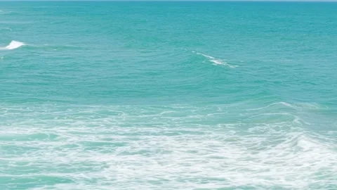 Approaching the Ocean on a Sunny Beach Stock Footage 308669920