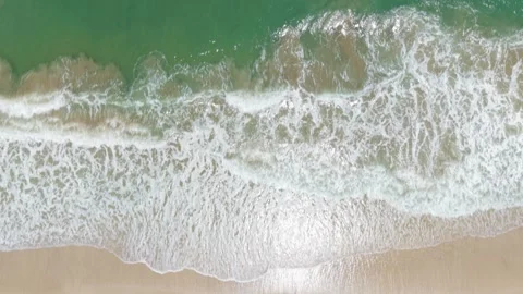 Approaching the Ocean on a Sunny Beach Stock Footage 308669988