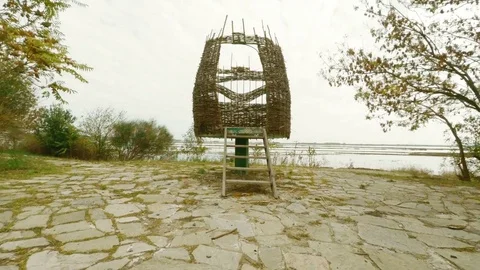 Approaching ornithologist hiding. Point of view Steadicam shot 4k Stock Footage 82176123