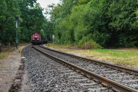The approaching railroad train. Stock Photos