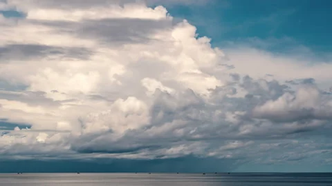 Approaching Rain Clouds Over Calm Sea With Fishing Boats. Video stock 303963266
