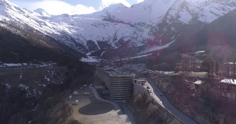 Approaching Saas Fee parking in twilight - Aerial 4K - Phantom 4 PRO Stock Footage 75157756