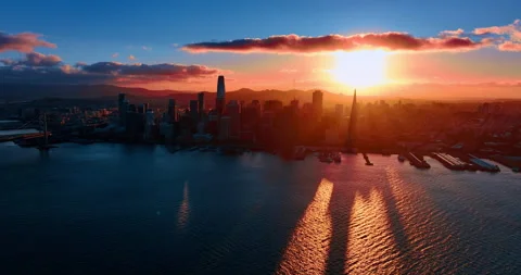 Approaching San Francisco skyline in the light of setting sun. Drone footage Stock Footage 330253292