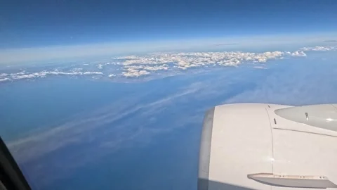 Approaching Sardinia: Airplane View of Clouds and Coastline Stock Footage 278898350
