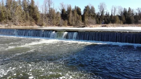 Approaching A Small Dam In Winter Stock Footage 141103842