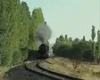 Approaching steam train going round bend SD Footage