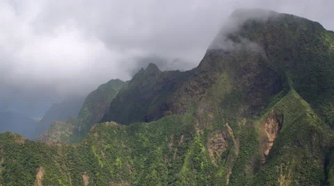 Approaching steep forested ridges in mist on Maui. Shot in 2010. Stock Footage 59524112