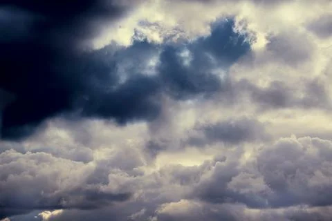 Approaching storm clouds, thunder clouds covering the sky, close-up of clouds Stock Photos