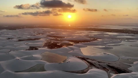 Approaching Sunset Over Interconnected Lagoons at Lençóis Maranhenses Stock Footage 342446459