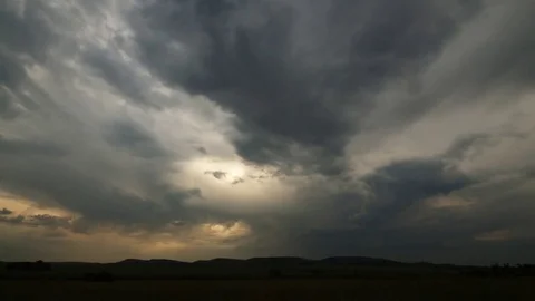 Approaching thunder storm over mountain time lapse Stock Footage