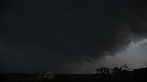 Approaching thunderstorm and leaden clouds with heavy rain and strong wind Stock Footage 199280655