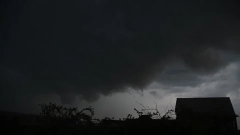 Approaching thunderstorm and leaden clouds with heavy rain and strong wind Stock Footage 199280666