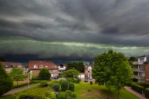 Approaching Thunderstorm Over Residential District Stock Photos