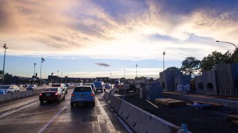 Approaching Toll Booth In Traffic Stock Photos