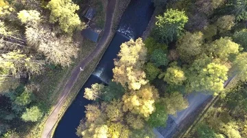 Approaching top down shot of river and forest in Norway near Maridalsvannet lake Stock Footage 85821671
