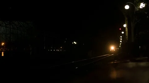 Approaching train at night Stock Footage 75613731