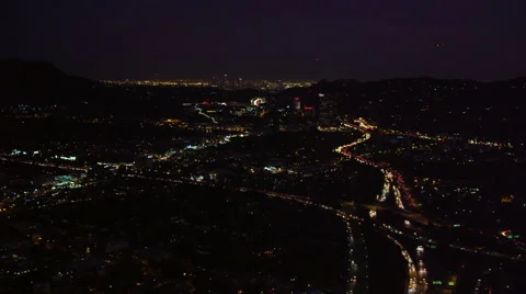 Approaching Universal City and downtown Los Angeles at night. Shot in 2010. Stock Footage