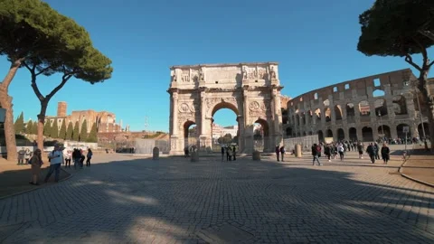 Approaching view of the Coliseum and Constantine arch  in Rome (Colosseo) Stock Footage 147193260