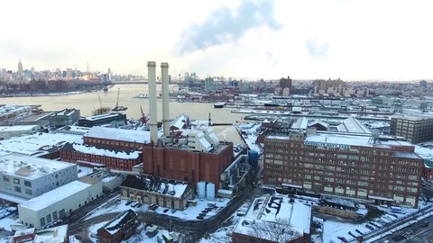 Approaching Winter View of Brooklyn Navy Yard and the Smoke Stacks Stock Footage 74643584