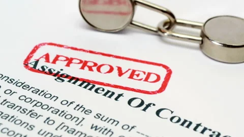 Approved Assignment of Contract Document with Locks Stock Footage 334488156