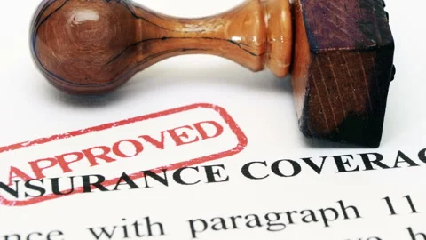Approved Insurance Coverage Document with Rubber Stamp Stock Footage 334080349