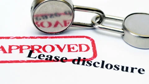 Approved Lease Disclosure Document with Locks on White Background Stock Footage 339633490